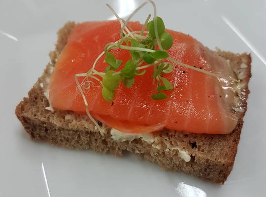Smoked salmon on rye with basil cream cheese